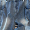 Washed Blue Curved Wide-Leg Denim Pants — Vintage Fade & Relaxed Knife-Leg Shape