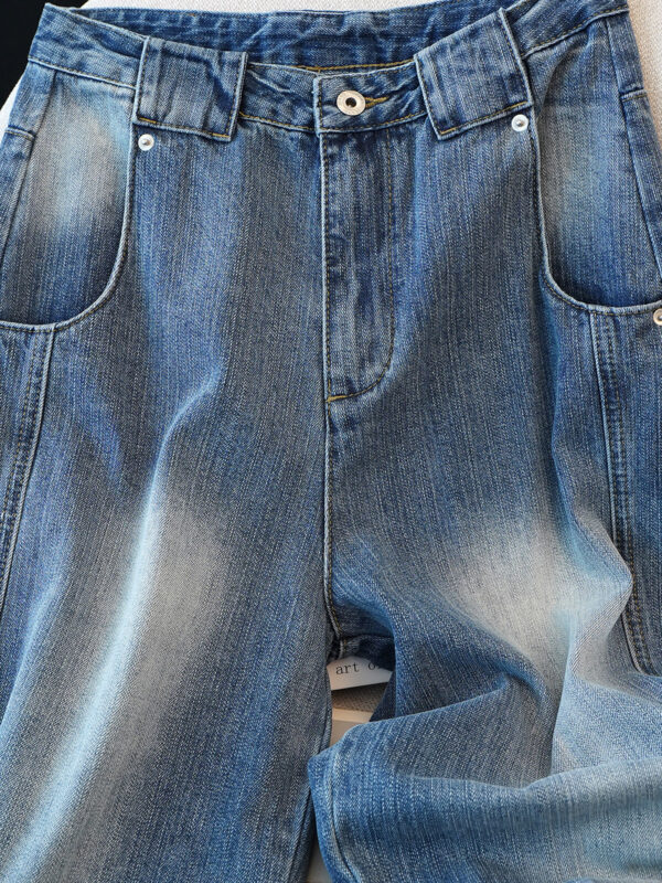 Washed Blue Curved Wide-Leg Denim Pants — Vintage Fade & Relaxed Knife-Leg Shape