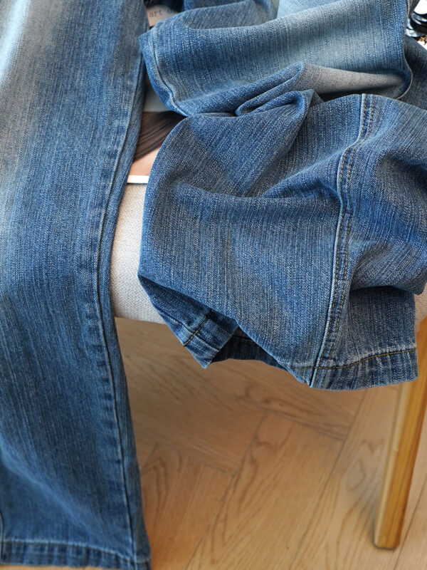 Washed Blue Curved Wide-Leg Denim Pants — Vintage Fade & Relaxed Knife-Leg Shape