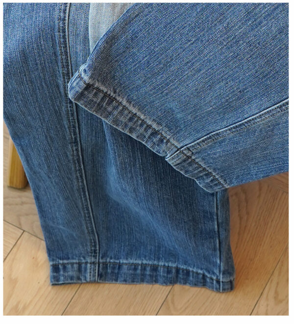 Washed Blue Curved Wide-Leg Denim Pants — Vintage Fade & Relaxed Knife-Leg Shape