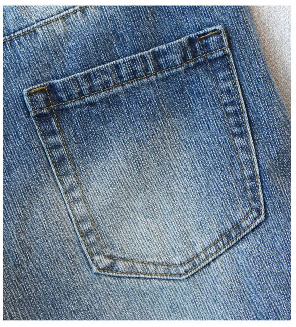 Washed Blue Curved Wide-Leg Denim Pants — Vintage Fade & Relaxed Knife-Leg Shape