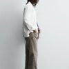 Irregular-Hem Mid-Waist Flare Denim Pants — Statement Layered Cuffs & Modern Casual Fit