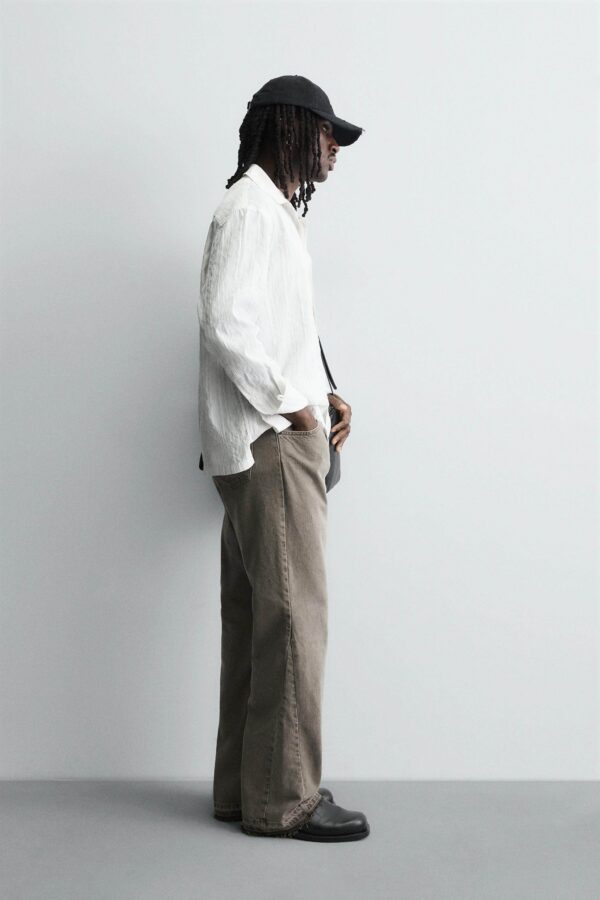 Irregular-Hem Mid-Waist Flare Denim Pants — Statement Layered Cuffs & Modern Casual Fit