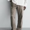 Irregular-Hem Mid-Waist Flare Denim Pants — Statement Layered Cuffs & Modern Casual Fit