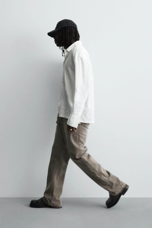 Irregular-Hem Mid-Waist Flare Denim Pants — Statement Layered Cuffs & Modern Casual Fit