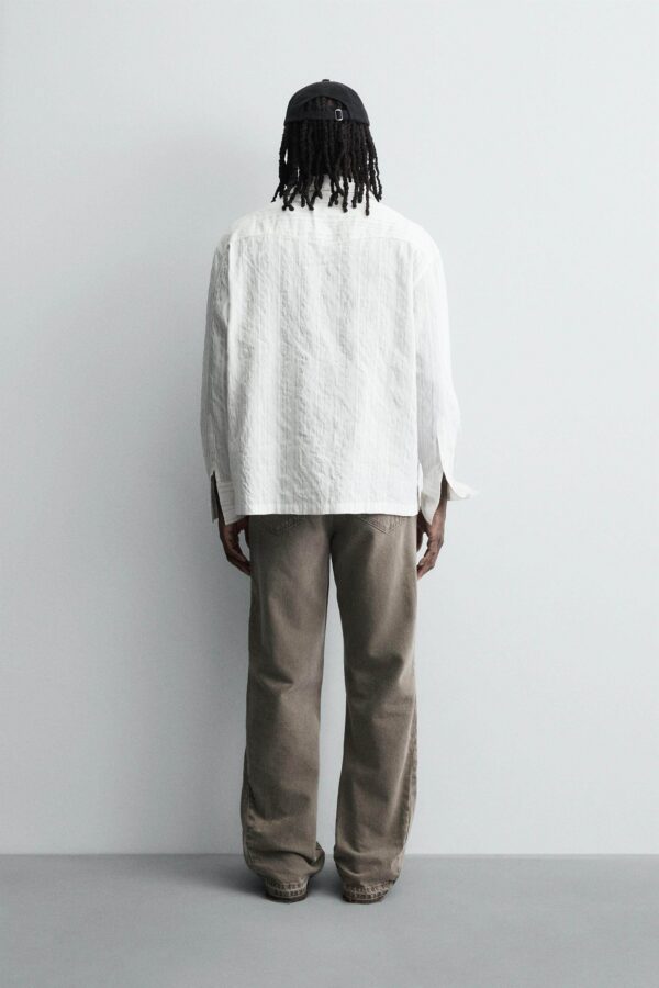 Irregular-Hem Mid-Waist Flare Denim Pants — Statement Layered Cuffs & Modern Casual Fit